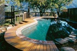 Make A Splash With These Stylish Wood Pool Deck Ideas