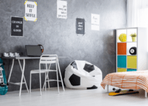 A playful small boys bedroom with desk for homework.