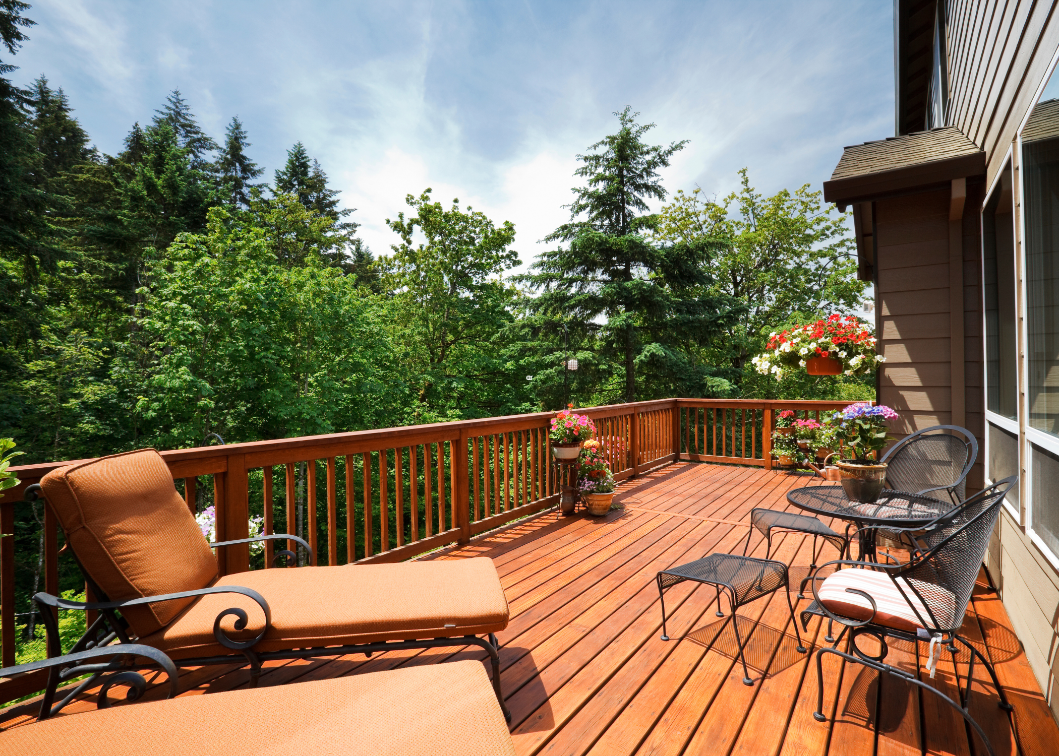 large deck with patio chairs