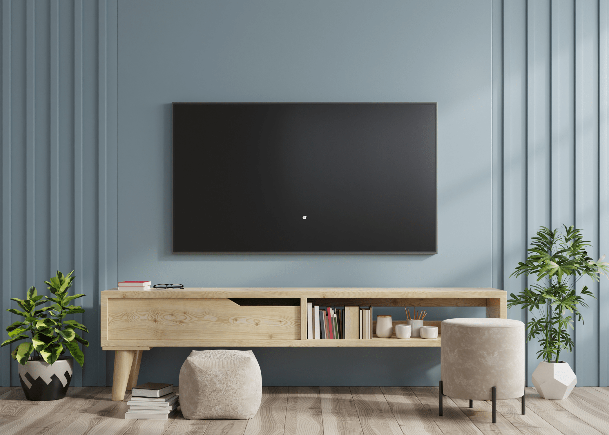 hanging tv on accent wall with low tv console