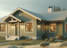 Sage green ranch style home with white chimney.