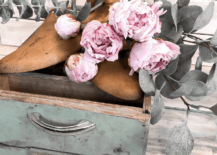 vintage drawer with shoe forms pink peonies and eucalytpus