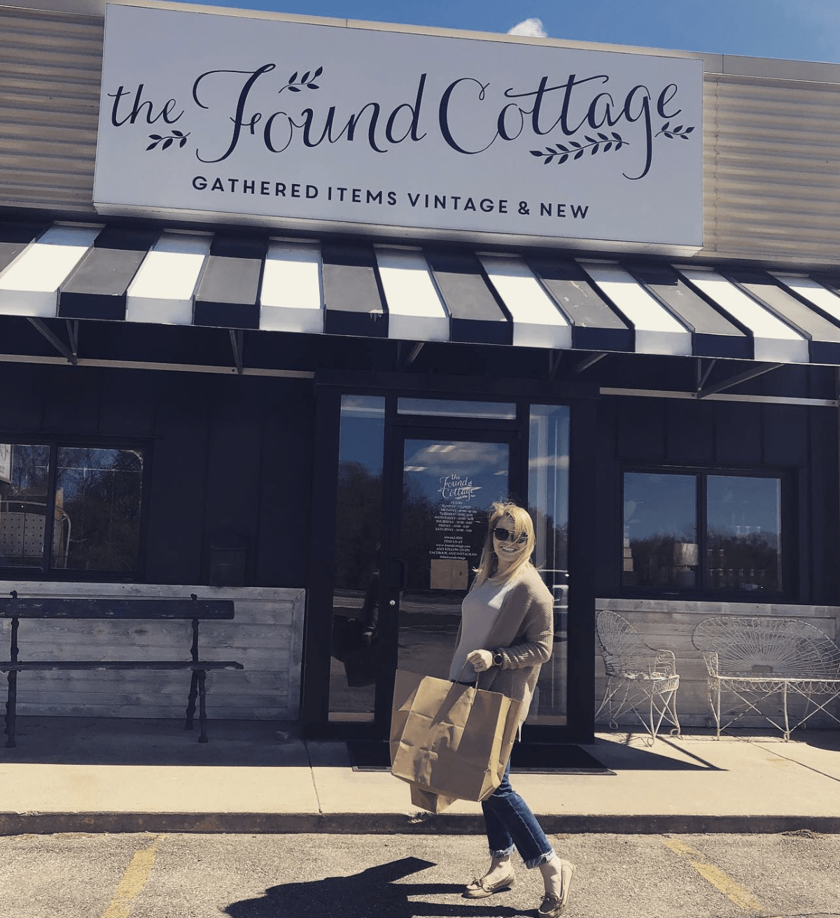 woman standing outside of The Found Cottage vintage antique store